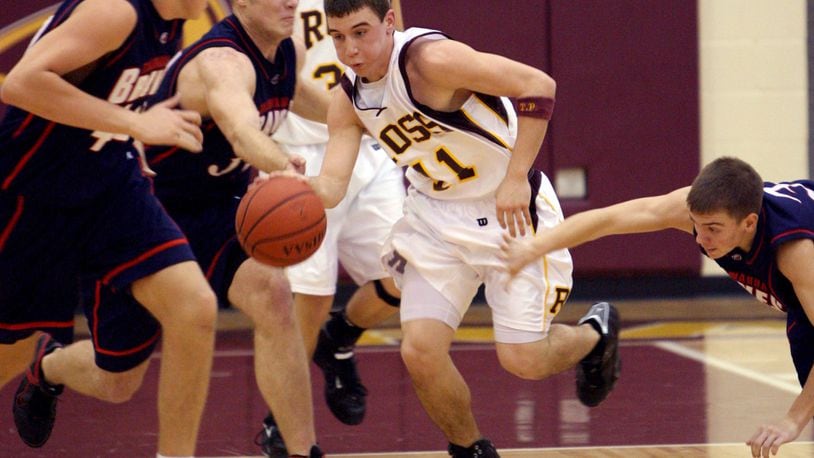Ross point guard David Lane comes up with the ball as Talawanda guard Joe Even (3) attempts to make a steal at Ross on Jan. 5, 2007. Also on the play for the Braves are Josh Claytor and Rhys Newman. CONTRIBUTED PHOTO BY E.L. HUBBARD