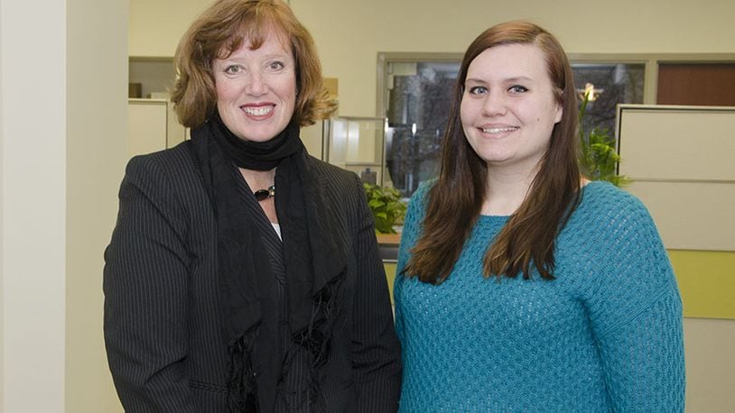 UC Blue Ash Dean Cady Short-Thompson, left, met with Chuntel Murawski, a 2010 Middletown High School graduate, to congratulate her on winning free tuition for the spring semester.