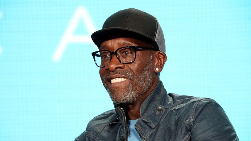 Don Cheadle  wore a T-shirt that read, "protect trans kids" while hosting "SNL" for the first time Saturday.