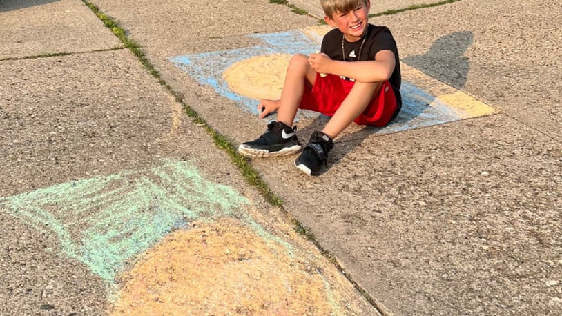 The Payne family submitted their photo of their art work done on their driveway. CONTRIBUTED