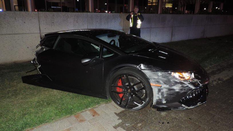 A Lamborghini was sheared in half after its driver hit a concrete light pole. (Photo: Fairfax County Fire and Rescue)