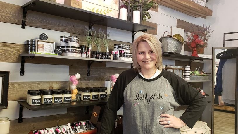 Venita Allen stands inside her boutique, LahVDah, at 408 Main St. in Hamilton. The shop features Allen s homemade artisan soap, body wash, lotion, lip balm, bath bombs, bubble cakes, beauty bars, body butter and face masks, as well as jewelry and clothing. ERIC SCHWARTZBERG/STAFF