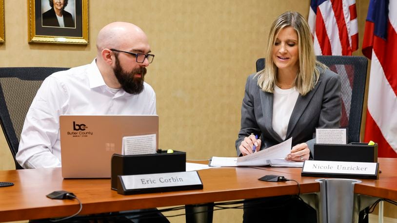 Butler County board of Elections Deputy Director Eric Corbin, left, and Director Nicole Unzicker will prepare for a special election in August. NICK GRAHAM/STAFF