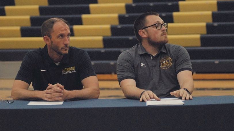 Casey Popplewell (left) and Justin Clemmons were introduced as Monroe High School's new boys basketball and girls basketball coaches at a community event on Monday. Chris Vogt/CONTRIBUTED