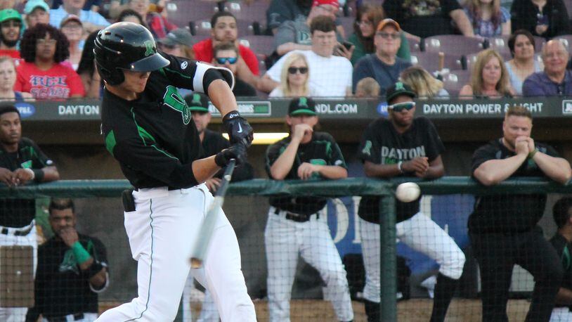 Dragons’ outfielder Stuart Fairchild sends a double to left field during the bottom of the first inning of Dayton’s second game of a doubleheader against the West Michigan Whitecaps at Fifth Third Field Thursday. Nick Dudukovich/CONTRIBUTED
