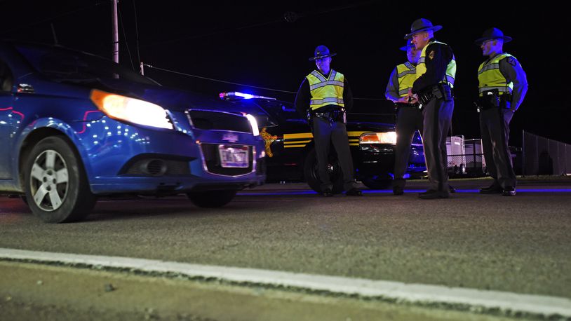 The Butler County OVI Task Force along with the Ohio State Highway Patrol, the Butler County Sheriff’s office and other local law enforcement agencies set up a sobriety checkpoint to check for impaired drivers Friday, Nov. 20 on US-127 in New Miami. NICK GRAHAM/STAFF
