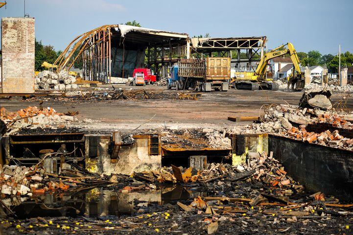 Demolition continues weeks after massive warehouse fire in Hamilton.