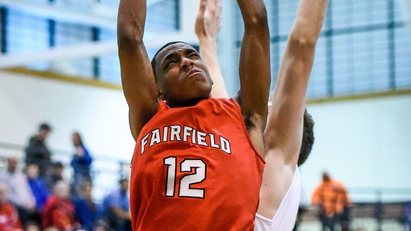 Fairfield’s Blake Spaulding goes up for a shot during the Indians’ game at Hamilton on Jan. 24, 2017. NICK GRAHAM/STAFF