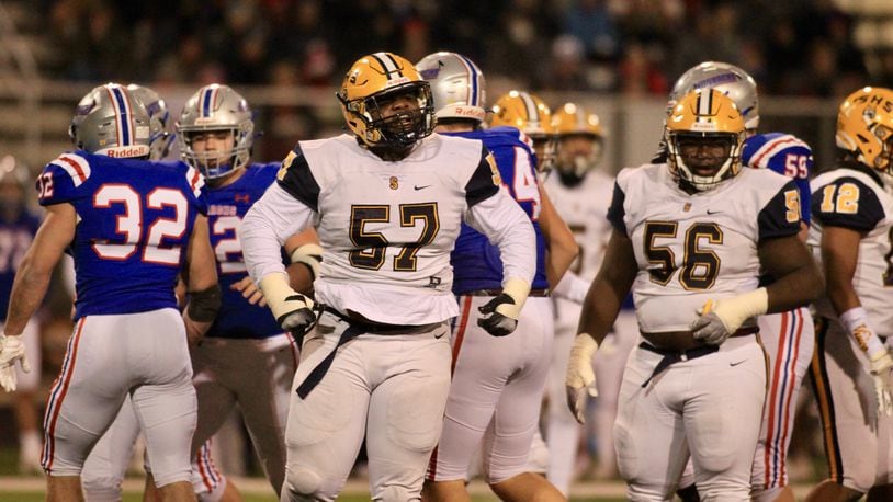 Springfield defensive linemen Jokell Brown and Tywan January line up for a play against Marysville in a Division I regional final on Nov. 19, 2021, at Hilliard Darby High School. David Jablonski/Staff
