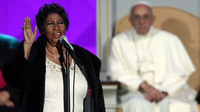 Pope Francis watches Aretha Franklin perform during the Festival of Families on September 26, 2015 in Philadelphia, Pennsylvania. Pope Francis is wrapping up his trip to the United States with two days in Philadelphia where he will attend the Festival of Families and will meet with prisoners at the Curran-Fromhold Correctional Facility.