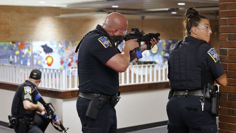 Middletown City Schools and Middletown Division of Police recently went through active shooter training scenarios in drills repeated by many districts locally and nationwide as classes begin to open on the 2022-2023 school year. Prompted in part by the May deadly shooting massacre at a Texas elementary school, school officials in Butler and Warren counties are ramping up school building security measures, often with the help of new Ohio school safety grants. NICK GRAHAM/STAFF