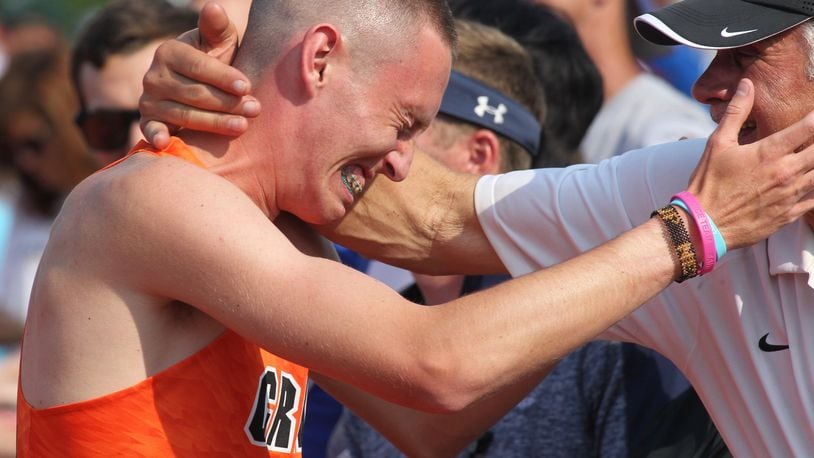Beavercreek’s Riley Buchholz wins the 1,600-meter race at the Division I state track and field championships on Saturday, June 1, 2019, at Jesse Owens Memorial Stadium in Columbus. David Jablonski/Staff