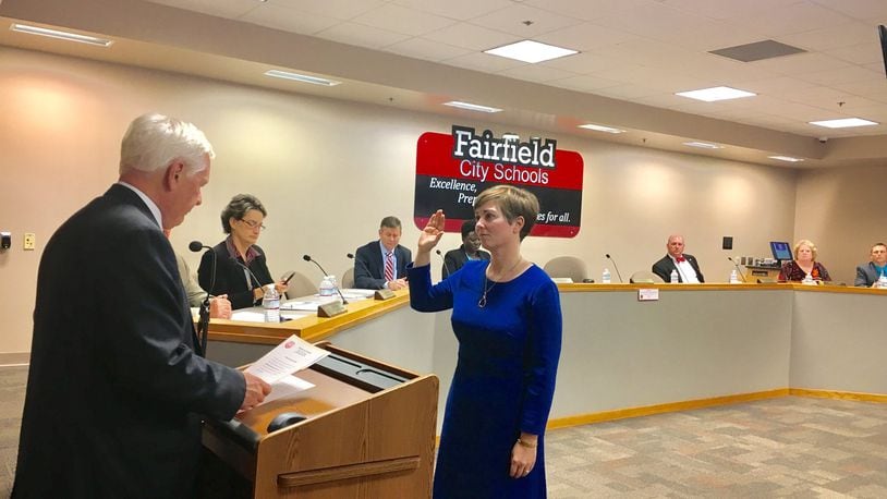 Newly appointed Fairfield Board of Education member Carrie O’Neal was sworn on to the board Thursday evening after board members voted unanimously to appoint her. O’Neal takes over the seat vacated by the death of board Vice President Jerome Kearns last month. MICHAEL D. CLARK/STAFF