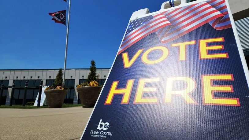 A "vote here" sign is seen at the Butler County Board of Elections headquarters in Hamilton on May 2, 2022. NICK GRAHAM/STAFF