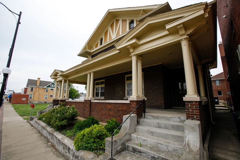 Hamilton residents hope to save attractive house in Main Street business district but developers want to tear it down to make way for apartments. NICK GRAHAM / STAFF