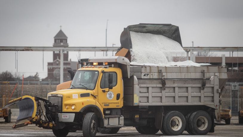 The Dayton salt barn was busy Thursday afternoon, Jan. 28, 2021, in preparation for a weekend snowstorm. JIM NOELKER/STAFF