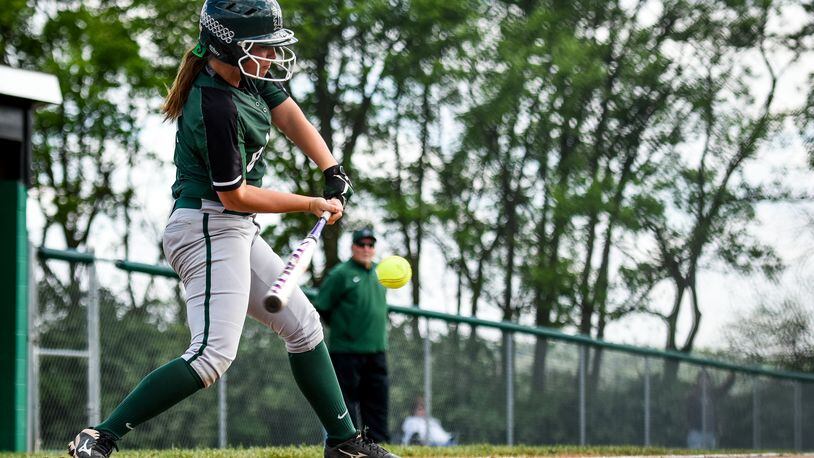 Badin’s Shelby Schmitt gets a piece of the ball during their softball game against Ross Thursday, April 27 at Joyce Park in Fairfield. NICK GRAHAM/STAFF