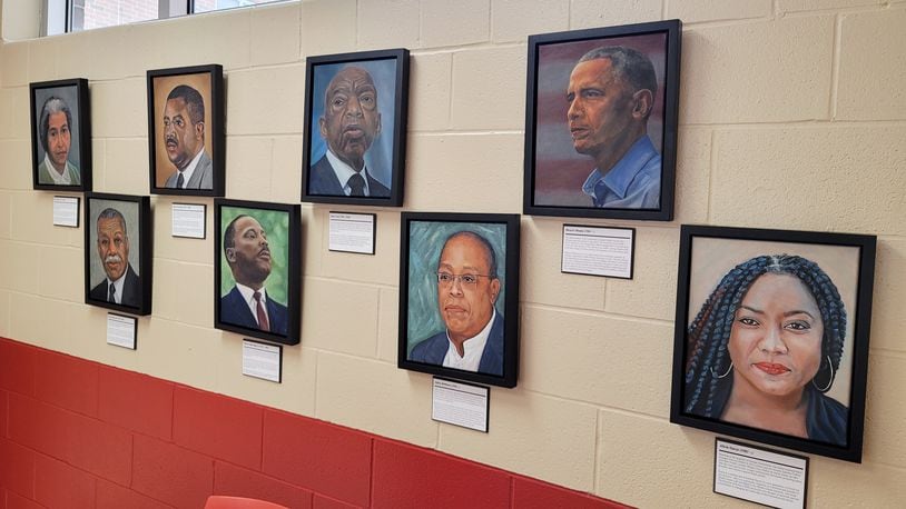 Artist John Wiehe created portraits of civil rights leaders that are displayed on the wall in Fairfield High School cafeteria. The series of paintings called "Connecting Past with Present: The Never-Ending Struggle for Civil Rights" shows 16 people ranging in time from enslavement to the Black Lives Matter movement. NICK GRAHAM  / STAFF