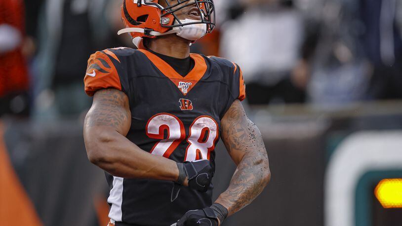 CINCINNATI, OH - DECEMBER 29: Joe Mixon #28 of the Cincinnati Bengals celebrates a touchdown during the second half against the Cleveland Browns at Paul Brown Stadium on December 29, 2019 in Cincinnati, Ohio. (Photo by Michael Hickey/Getty Images)