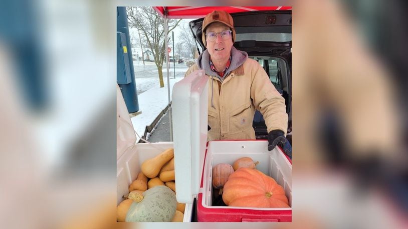 Craig Harkrider shows a variety of winter squash grown at his Stoney Hedgerow Farm. He sells it at the Oxford Farmers Market and at MOON Co-Op. CONTRIBUTED