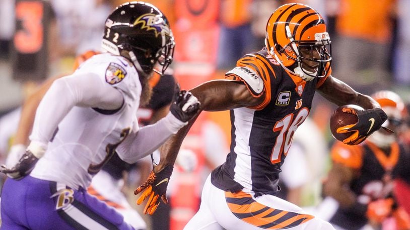 Cincinnati Bengals wide receiver A.J. Green carries the ball in for a touchdown during their game against the Baltimore Ravens Thursday, Sept. 13 at Paul Brown Stadium in Cincinnati. The Cincinnati Bengals defeated the Baltimore Ravens 34-23. NICK GRAHAM/STAFF