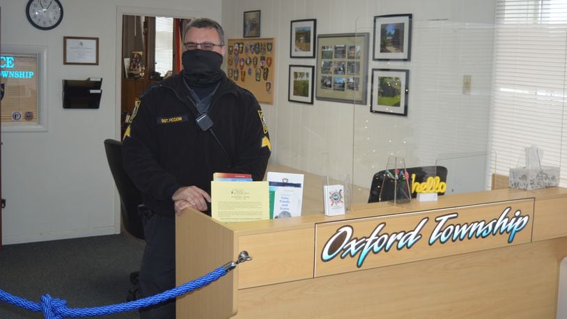 Oxford Twp. Police Sgt. Patrick Piccioni stands behind the new office counter purchased with the township’s CARES Act funds. CONTRIBUTED/BOB RATTERMAN