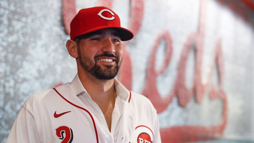 Cincinnati Reds’ Nick Castellanos waits for interviews during a news conference, Tuesday, Jan. 28, 2020, in Cincinnati. Castellanos signed a $64 million, four-year deal with the baseball club. (AP Photo/John Minchillo)