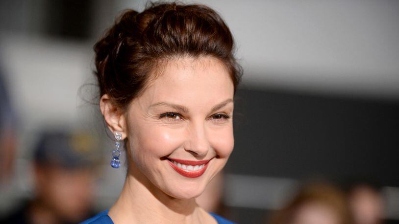 FILE - In this March 18, 2014, file photo, Ashley Judd arrives at the world premiere of "Divergent" at the Westwood Regency Village Theater in Los Angeles. Judd on âGood Morning America,â Thursday, Oct. 26, 2017, said Harvey Weinstein made sexual advances toward her two decades ago. Judd was among the first of what has become dozens of women alleging sexual harassment or assault by Weinstein, who is now under criminal investigation for rape in several cities. (Photo by Jordan Strauss/Invision/AP, File)
