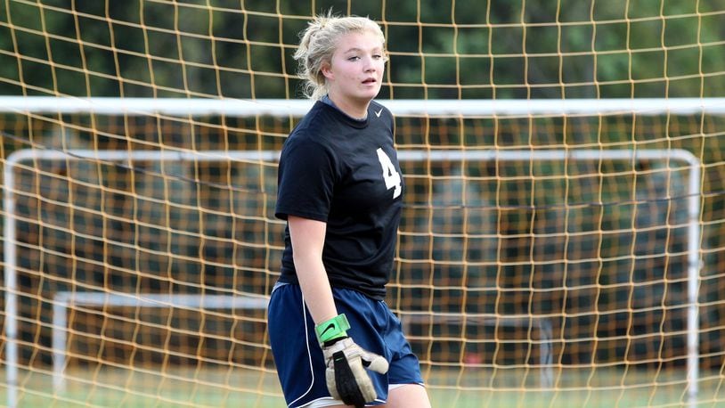 Ross goalkeeper Anna Hall works out during a Sept. 16, 2013, practice session at the school. COX MEDIA FILE PHOTO