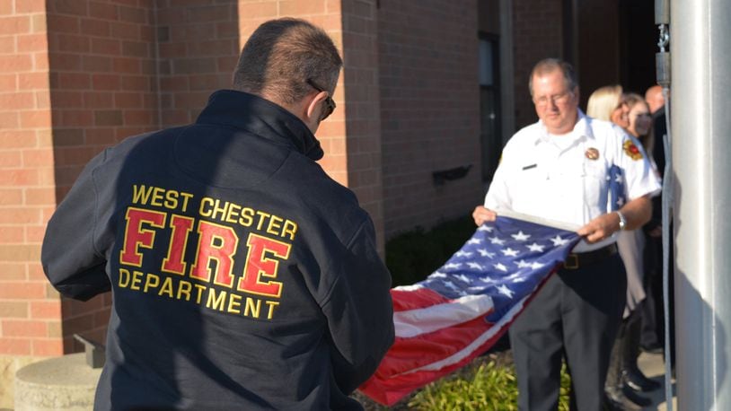 A flag flown by West Chester Twp. late last year could be visible on the podium with U.S. athletes this month during the Winter Olympics in Pyeongchang, South Korea. The flag, part of the Team USA Bobsled and Skeleton American Flag First Responders Relay, flew at West Chester Fire Headquarters Oct. 26, where the honor guard was present for a brief ceremony. It also flew briefly at the West Chester Police Department. CONTRIBUTED