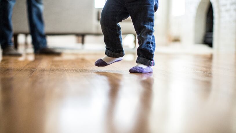 Toddler wearing jeans (stock photo)