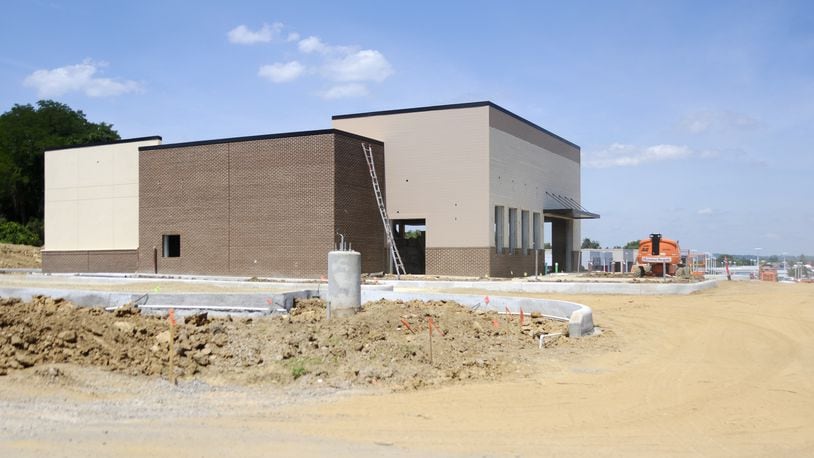 Construction on a new Panera Bread at 5875 Dixie Highway in Fairfield started last month. The restaurant is expected to be completed sometime in early 2021. The store will be in front of Shared Harvest Foodbank, which sold part of its land on Ohio 4 for development. MICHAEL D. PITMAN/STAFF