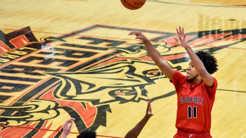 Fairfield's Logan Woods puts up a shot during their basketball game against Lakota West Friday, February 12, 2021 at Lakota West High School in West Chester Township. Fairfield won 81-76. NICK GRAHAM / STAFF