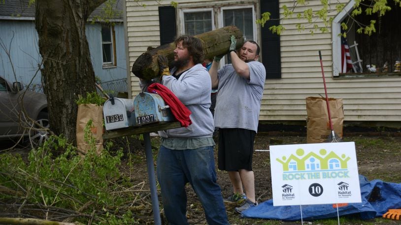 On the heels of Habitat for Humanity’s Rock the Block in April, Fairfield Twp. will hold its 10th annual spring cleanup day on June 1. Pictured is activity from the April 13, 2019, Rock the Block event were more than 11 Dumpters were filled with trash and debris. MICHAEL D. PITMAN/FILE