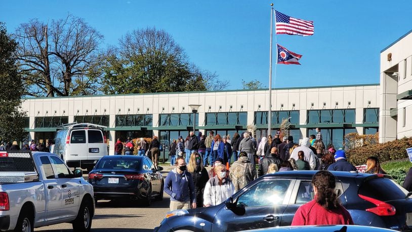 A long line forms on the last day of early voting at the Butler County Board of Elections Monday, Nov. 2, 2020 in Hamilton. NICK GRAHAM / STAFF