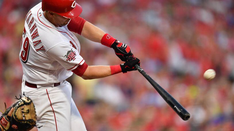 CINCINNATI, OH - JULY 19:  Ryan Lavarnway #59 of the Cincinnati Reds hits a three-run home run in the fourth inning against the St. Louis Cardinals at Great American Ball Park on July 19, 2019 in Cincinnati, Ohio.  (Photo by Jamie Sabau/Getty Images)