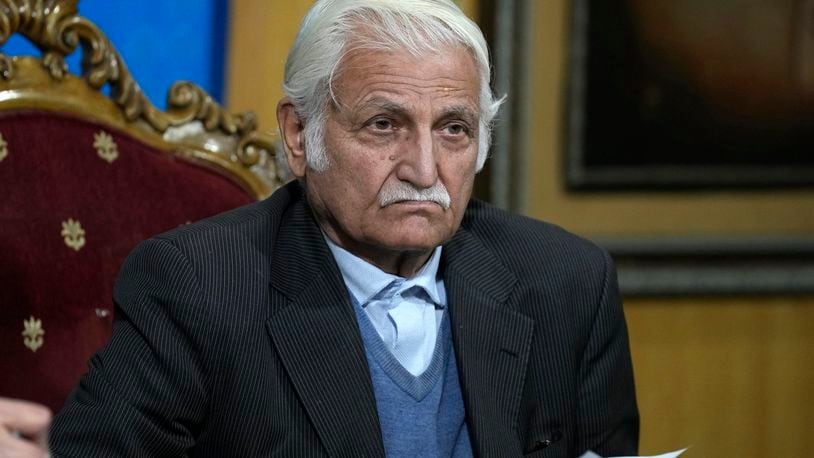 FILE - Farhatullah Babar, a veteran human rights activist and member of the Human Rights Commission of Pakistan, listens to a reporter during a news conference, in Islamabad, Pakistan, Monday, Jan. 1, 2024. Babar, an important ally of Pakistani Prime Minister Shehbaz Sharif, demanded the government lift a two-month-old ban on the social media platform X, saying it violates citizens' right to speech and expression. (AP Photo/Anjum Naveed, File)