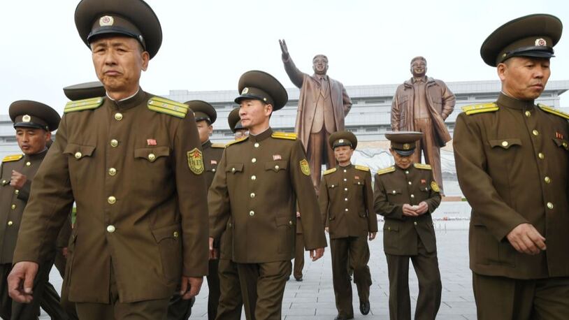 North Korean military personnel visit Mansu Hill in Pyongyang to lay flowers at the bronze statues of the country's two late leaders, Kim Il Sung and Kim Jong Il, on the 85th anniversary of the founding of its armed forces.