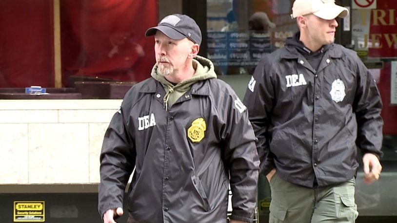 Federal agencies raided a Downtown jewelry shop Thursday, Nov. 14, 2019, bagging and boxing large amounts of evidence inside. Agents with the Drug Enforcement Administration spent the afternoon at Tri-State Jewelers on Race Street. WCPO-TV