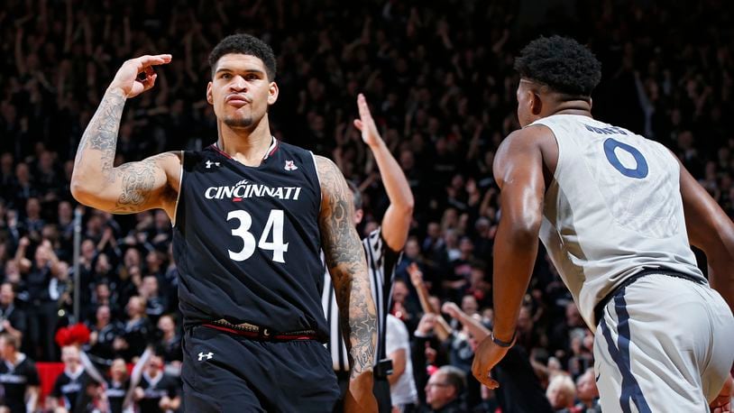 CINCINNATI, OH - JANUARY 26: Jarron Cumberland #34 of the Cincinnati Bearcats reacts after making a three-point basket against the Xavier Musketeers in the second half of the game at Fifth Third Arena on January 26, 2017 in Cincinnati, Ohio. Cincinnati defeated Xavier 86-78. (Photo by Joe Robbins/Getty Images)