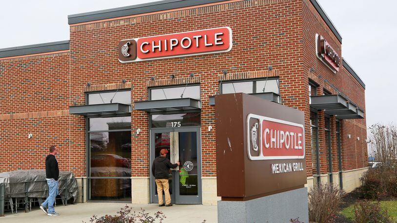 Chipotle Mexican Grill in Monroe, Ohio, GREG LYNCH / STAFF Customers visit the Chipotle Mexican Grill in Monroe during the lunch time rush, Thursday, Dec. 10, 2015. Unconfirmed cases of E. Coli have been reported at Chipolte locations in Ohio and other states. GREG LYNCH / STAFF