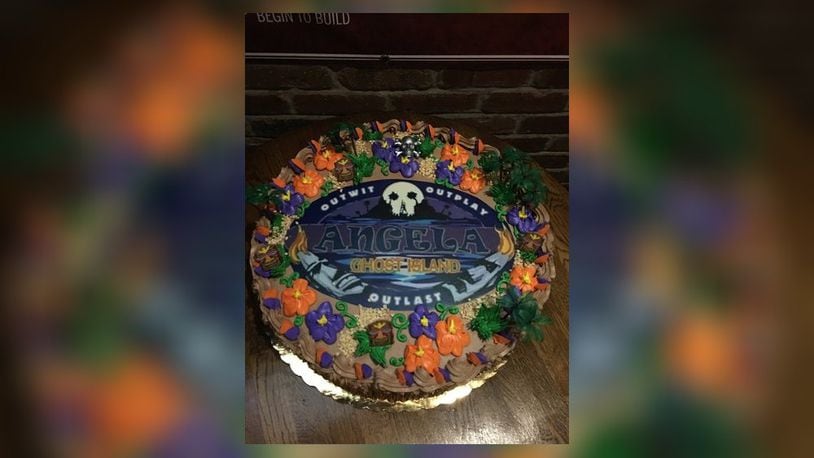 A large group of fans turned out last night at the Buffalo Wings and Rings in Mason, to watch local mom and military veteran, Angela Perkins compete in the CBS television series “Survivor.” They made a cake for the occasion.