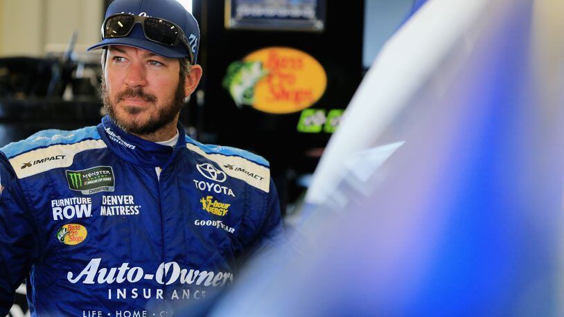 SPARTA, KY - JULY 13: Martin Truex Jr., driver of the #78 Auto-Owners Insurance Toyota, stands in the garage area during practice for the Monster Energy NASCAR Cup Series Quaker State 400 presented by Walmart at Kentucky Speedway on July 13, 2018 in Sparta, Kentucky. (Photo by Daniel Shirey/Getty Images)
