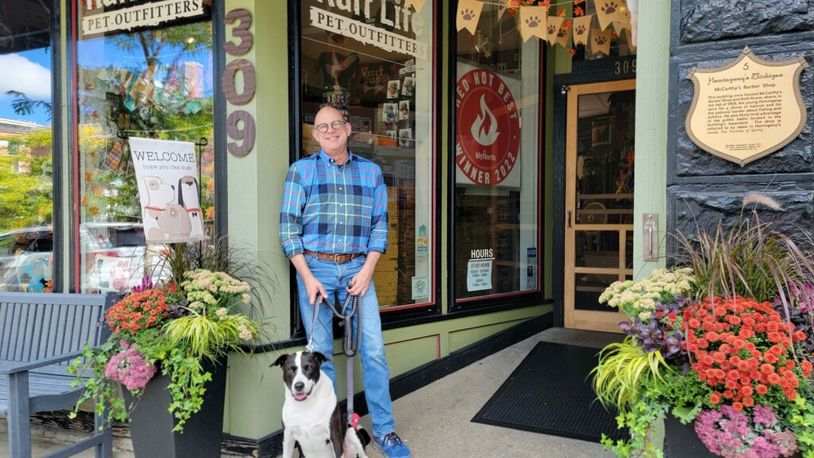 Gary and his best bud, Jack, standing outside of Ruff Life Pet Outfitters in Petoskey, Michigan. CONTRIBUTED