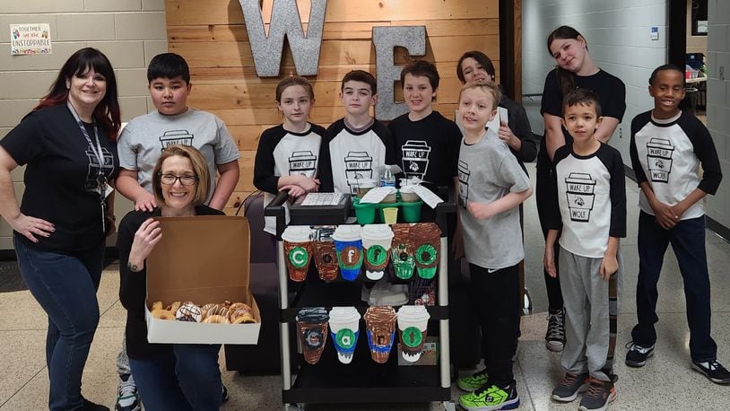 Lakota students are getting their entrepreneurial lessons on wheels by running snack carts for teachers and classmates. The rolling business exposure is proving both enlightening and useful for students and staffers, said Lakota teachers overseeing the program. Pictured is the snack cart crew at Woodland Elementary. CONTRIBUTED