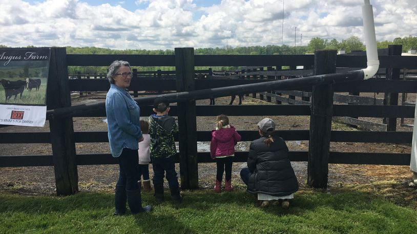 People in May visited Pedro’s Angus Farm in Milford Township to experience a working farm and learn about its operations. Farmers and prospective agricultural entrepreneurs are invited to a class about diverse farming options in coming months. MIKE RUTLEDGE / STAFF