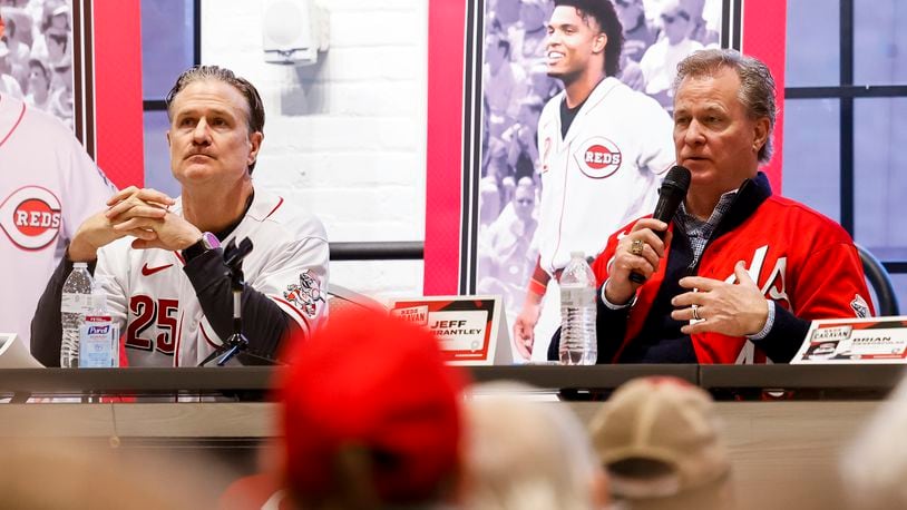 Reds broadcaster Jeff Brantley, right, speaks to the crowd seated next to Reds manager David Bell during the Reds Caravan stop at Spooky Nook Sports Champion Mill Monday, Jan. 23, 2023 in Hamilton. The West Tour fan stops in Ohio and Indiana include major league infielder Jose Barrero, minor league outfielder Austin Hendrick, manager David Bell, alumni Corky Miller, broadcasters Jeff Brantley and Brian Giesenschlag and mascot Rosie Red. NICK GRAHAM/STAFF