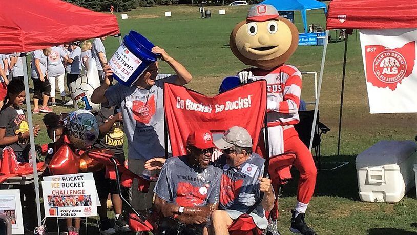 Former Ohio State football player William White, left in OSU hat, took the ice bucket challenge last year and this year will be joined by several former Buckeye coaches and players to raise money for the local ALS chapter. White has suffered with the disease for three years. CONTRIBUTED