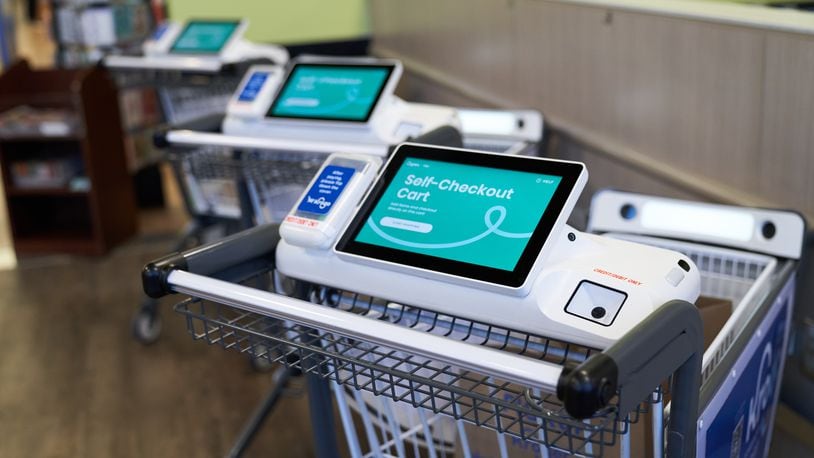 The Monroe Kroger now offers 10 new KroGO shopping carts, which allow shoppers to scan as they go and the ability to avoid the checkout. CONTRIBUTED