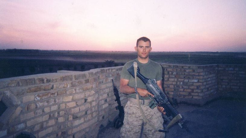 Taylor Prazynski poses in Fallujah, Iraq, in the spring of 2005. CONTRIBUTED PHOTO